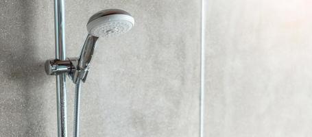 shower head with wall background in modern bathroom photo