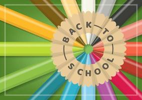 Back to school with color pencils in circular alignment on green background from top view vector