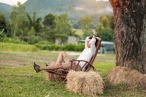 Young man relaxing in garden. Nature and freedom concept photo