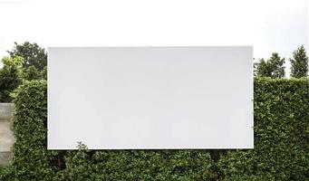 White blank billboard. Large blank billboard with nature tree. photo