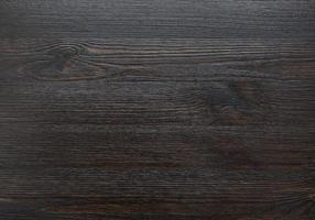 superficie de fondo de textura de madera blanda negra con patrón natural antiguo. panel de madera. foto de alta calidad