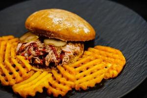 spicy Pulled Pork with golden fries photo