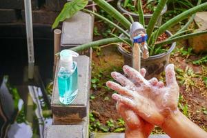 washing hands under the water tap. Hygiene concept hand detail. Pro photo