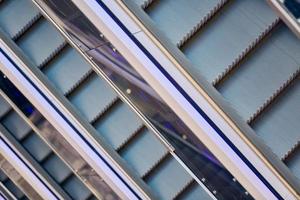 Modern escalators in shopping center photo