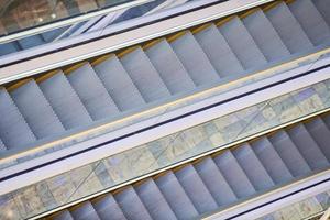 Escalators in shopping center photo