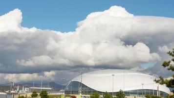SOCHI, RUSSIAN FEDERATION NOVEMBER 17, 2020 - Thick rainclouds swirling over Bolshoy Ice Dome, Sochi, Caucasus, Russia. Time lapse. video