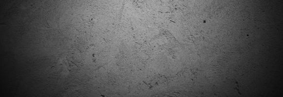 Scary dark walls, slightly light black concrete cement texture for background. Brush scratches on the wall photo