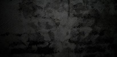 cemento negro gris oscuro para el fondo. fondo de textura de hormigón de piedra negra foto