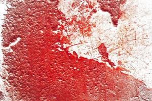 fondo rojo pared sangrienta de miedo. pared blanca con salpicaduras de sangre para el fondo de halloween. foto