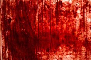 Red background, Scary bloody wall. white wall with blood splatter for halloween background. photo