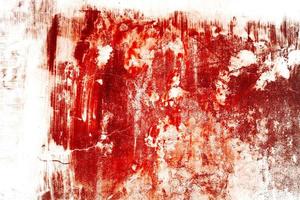 pared sangrienta de miedo. pared blanca con salpicaduras de sangre para el fondo de halloween. foto