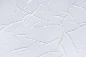 Blank paper crumpled texture and creased paper poster background. Wet crumpled paper texture backgrounds for various purposes. Realistic posters Paper crumpled texture background. photo