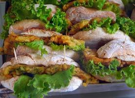 close up many of sandwish filled with deep fried mixed and green leaf for wallpaper food photo