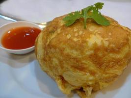 Close-up Delicious Local thick omelet omelette signature dish restaurant thailand photo