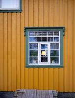Geometric shape wooden and glass window elevation  local design in Norway photo