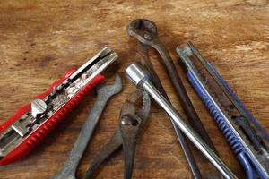 Old tools on a wooden table photo