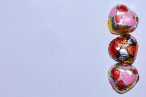 Chocolate heart on a white background. photo