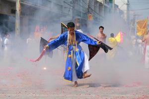 Korat, THAILAND - OCTOBER 27 Unidentified devotee of Vegetarian Festival, person who invites the spirits of gods to possess their bodies on October 16, 2015  in Korat, Thailand photo