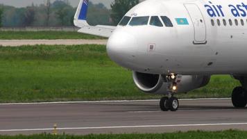 ALMATY, KAZAKHSTAN MAY 4, 2019 - Air Astana Airbus A320 P4 KBD taxiing after landing, Almaty International Airport, Kazakhstan video