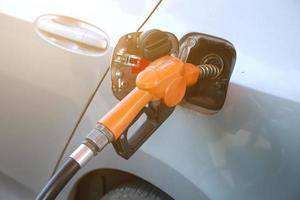 Colorful Petrol pump filling nozzles  , Gas station in a service photo