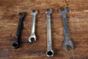 Old tools on a wooden table photo