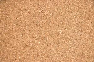 Closed up of brown cork board texture background photo