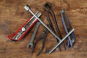 Old tools on a wooden table photo