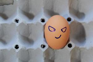 Emotion of fresh eggs  on a straw. photo