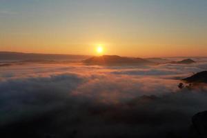 Great views of Sunrise with mountains and cloud. photo
