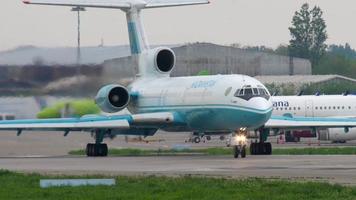 ALMATY, KAZAKHSTAN MAY 4, 2019 - Kazakhstan Kaz Air Trans Tupolev 154 UP T5401 taxiing before departure, Almaty International Airport, Kazakhstan video