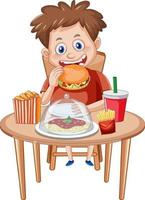 A boy enjoying junk food meal at the table vector