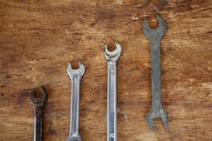 Old tools on a wooden table photo