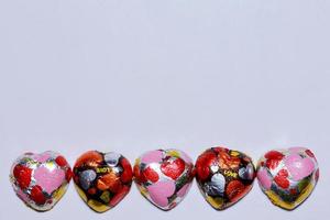 Chocolate heart on a white background. photo