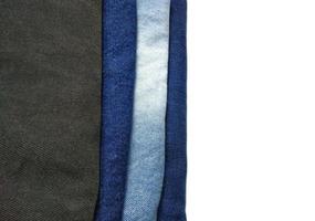 Blue jeans Are neatly folded into layers And white space is copied Use them as backgrounds and wallpapers. photo