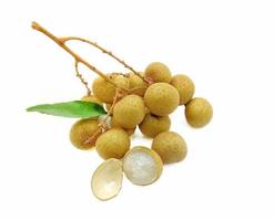 A bunch of yellow longans on a white background.  It is a Thai fruit that is sweet, juicy and nutritious. photo