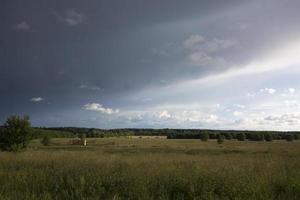 landscape with majestic beautiful dramatic pre-threatening sky. Cloudy sky photo