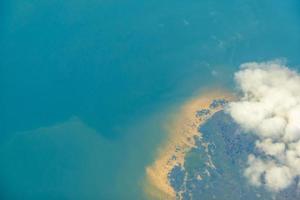 Aerial photo of Farmland. view from the plane to the ground. golden sandy beach