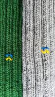 Handmade balaclava with Ukrainian symbols. Knitted from gray and green threads. Warms, reliably saves from the cold. photo