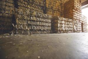 Stack of paper waste before shredding at recycling photo