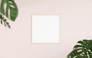 Clean and minimalist front view square wooden photo or poster frame mockup hanging on the wall with blurry plant. 3d rendering.