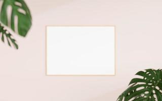 Clean and minimalist front view horizontal wooden photo or poster frame mockup hanging on the wall with blurry plant. 3d rendering.