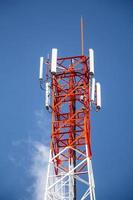 telecommunications tower with blue sky photo