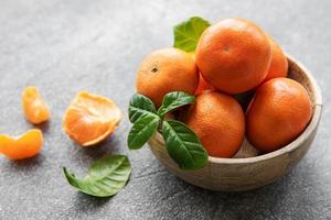 Fresh citrus fruits tangerines, oranges photo