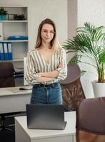 Young woman working on a computer photo