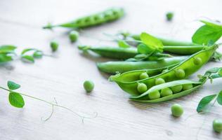 Green peas with leaves photo