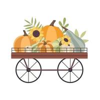 concepto de otoño para el festival de la cosecha o el día de acción de gracias. carro con calabazas, girasoles y hojas. fondo para carteles, web, pancartas, volantes, postales