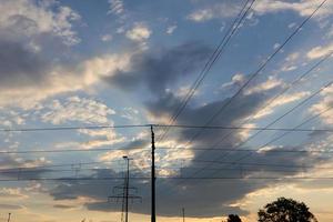 Electric pole and wires carrying current photo