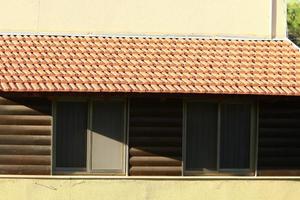 Red tiled roof on a residential building in Israel photo