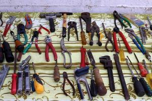 Old things and tools are sold at a flea market in Israel photo