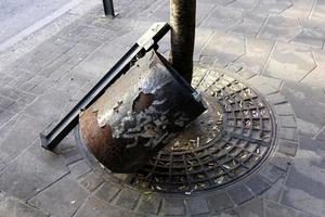 Ashtray - a container for tobacco ash, cigarette butts, cigars. photo